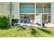This unit features a screened lanai with outdoor seating at 1018 Wexford Blvd # 1018, Venice, FL 34293