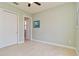 Neutral bedroom featuring a closet and soft carpeting for a cozy and relaxing space at 10618 Corkwood Ct, Venice, FL 34293