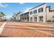 Charming street view of shops and restaurants, reflecting the vibrant atmosphere of the community at 10618 Corkwood Ct, Venice, FL 34293