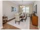 Formal dining room featuring a chandelier and coordinated decor at 10973 Trevino St, Englewood, FL 34223
