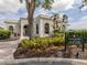 Exterior view of the Tennis and Fitness Center with lush landscaping and signage at 10973 Trevino St, Englewood, FL 34223