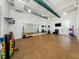 Bright fitness studio with mirrors, ample space, and fitness equipment at 10973 Trevino St, Englewood, FL 34223