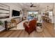 Spacious living room with large windows and an open-concept design at 10973 Trevino St, Englewood, FL 34223
