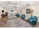 Inviting lobby with comfortable seating, stylish rugs, and decorative lighting features at 10973 Trevino St, Englewood, FL 34223