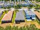 Aerial view of the property highlighting its layout, outdoor space, and neighborhood setting at 12478 Sagewood Dr, Venice, FL 34293