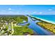 Community with beautiful waterfront views and lush landscaping along canal at 12478 Sagewood Dr, Venice, FL 34293