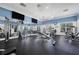 Bright fitness center with weights, machines, and mirrors for a complete workout at 12478 Sagewood Dr, Venice, FL 34293