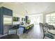 Spacious community kitchen with stainless steel appliances, large island and comfortable seating at 12478 Sagewood Dr, Venice, FL 34293
