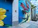 Colorful outdoor mural art adds vibrant interest to community spaces at 12478 Sagewood Dr, Venice, FL 34293