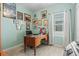 Office with light wood flooring, a dark wood desk, and bright natural light at 12478 Sagewood Dr, Venice, FL 34293