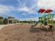 Fun community playground with slides, swings, and covered picnic area at 12478 Sagewood Dr, Venice, FL 34293