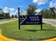 Downtown Wellen Park sign with lush green lawn at 12478 Sagewood Dr, Venice, FL 34293