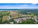 An aerial view showcasing the property's peaceful location and close proximity to the water at 129 Preserve Pl # D, Nokomis, FL 34275