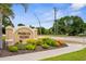 The Pinebrook Preserve community sign with colorful landscaping, offering a warm welcome to residents and visitors at 129 Preserve Pl # D, Nokomis, FL 34275