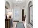 Welcoming entryway with tiled flooring, arched doorways, and decorative accents at 129 Preserve Pl # D, Nokomis, FL 34275