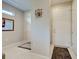 Bright foyer featuring tile flooring, neutral walls, and decorative mirrors at 13731 Vadini St, Venice, FL 34293