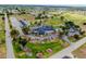 Community clubhouse and amenities center next to a golf course offer a relaxed atmosphere at 144 Rotonda Cir, Rotonda West, FL 33947