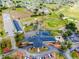 Community clubhouse next to a golf course offers a relaxed and recreational atmosphere at 144 Rotonda Cir, Rotonda West, FL 33947