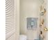 Cozy bathroom featuring a shower with a patterned curtain and beach-themed towels at 144 Rotonda Cir, Rotonda West, FL 33947