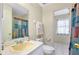 Bathroom features a single sink vanity and walk-in shower at 144 Rotonda Cir, Rotonda West, FL 33947