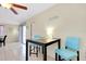 Cozy dining area features tile flooring and a charming 