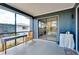 Enclosed lanai with sliding doors and view of backyard, creating a relaxing outdoor living space at 144 Rotonda Cir, Rotonda West, FL 33947
