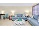 Bright living room with comfortable sofas, decorative pillows, and stylish accents, creating a welcoming atmosphere at 144 Rotonda Cir, Rotonda West, FL 33947