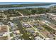 Aerial view of waterfront neighborhood with numerous canal front homes and boating access at 15448 Avery Rd, Port Charlotte, FL 33981