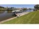 Home with a private boat dock and lift, offering convenient access to the waterways and waterfront living at 15448 Avery Rd, Port Charlotte, FL 33981