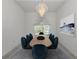 Formal dining room showcasing a modern chandelier, elegant table setting, and scenic window view at 15448 Avery Rd, Port Charlotte, FL 33981