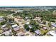 Aerial view of homes in a lush community near a waterway at 1568 Ringtail Rd, Venice, FL 34293