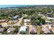 Aerial view of homes in a lush community near a waterway at 1568 Ringtail Rd, Venice, FL 34293