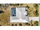 Aerial view of the rear of the home, showcasing a pool, and the large roof at 1568 Ringtail Rd, Venice, FL 34293