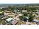 Aerial view of homes in a lush community near a waterway at 1568 Ringtail Rd, Venice, FL 34293
