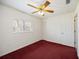 Bedroom with a ceiling fan, closet and window offering plenty of natural light at 1568 Ringtail Rd, Venice, FL 34293