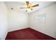 Bright bedroom with a ceiling fan, neutral walls, and window providing natural light at 1568 Ringtail Rd, Venice, FL 34293