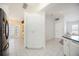 Open kitchen layout featuring ample counter space and convenient access to living areas at 1568 Ringtail Rd, Venice, FL 34293