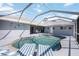 Covered Pool featuring a lounge area and access to home at 1568 Ringtail Rd, Venice, FL 34293