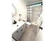 Bright bathroom featuring a modern vanity, toilet, and walk-in shower at 177 Palm Harbor Dr, North Port, FL 34287
