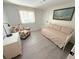 Guest bedroom featuring a daybed, dresser, and chair at 177 Palm Harbor Dr, North Port, FL 34287