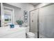 Clean bathroom featuring a walk-in shower, elegant finishes and modern fixtures at 18001 Grand Prosperity Dr, Venice, FL 34293
