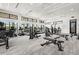 Well-equipped fitness center with treadmills, weight machines, and open space for versatile workouts at 18001 Grand Prosperity Dr, Venice, FL 34293