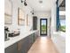 Modern clubhouse kitchenette with sleek countertops and cabinetry at 18001 Grand Prosperity Dr, Venice, FL 34293