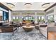Inviting clubhouse lounge area with stylish seating and contemporary decor at 18001 Grand Prosperity Dr, Venice, FL 34293