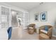 Bright office area features french doors, neutral decor, and stairs leading to the next level at 18001 Grand Prosperity Dr, Venice, FL 34293