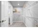 This walk-in closet offers plenty of open shelving and storage at 18001 Grand Prosperity Dr, Venice, FL 34293