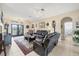 This living room has neutral walls, double doors to the outside, and tile flooring at 2000 Jasmine Way, North Port, FL 34287