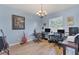 Spacious home office with wood floors, lots of natural light, and plenty of space for two desks at 2000 Jasmine Way, North Port, FL 34287