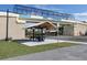 Legacy Trail bridge over a street with covered rest stop at 2022 Calusa Lakes Blvd, Nokomis, FL 34275