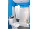 Bathroom featuring a shower with tub, a gray and white shower curtain and a toilet at 2682 Yamada Ln, North Port, FL 34286